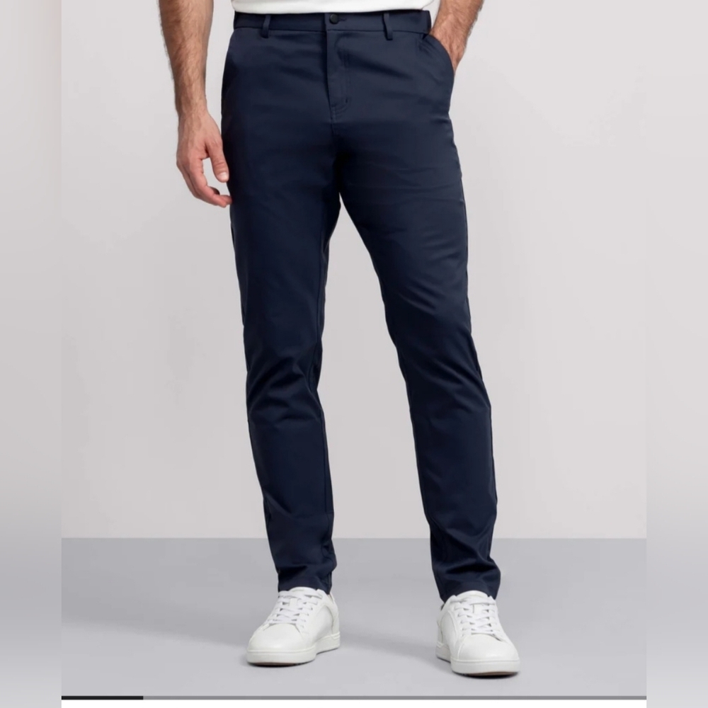 JACK ARCHER JETSETTER STRAIGHT FIT TECH PANTS. SIZE 38X28. DEEP BLUE.